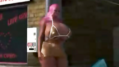 Hot big bosomed girl preparing to strip performance