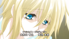 Handsome blonde teen with big blue eyes in anime toon